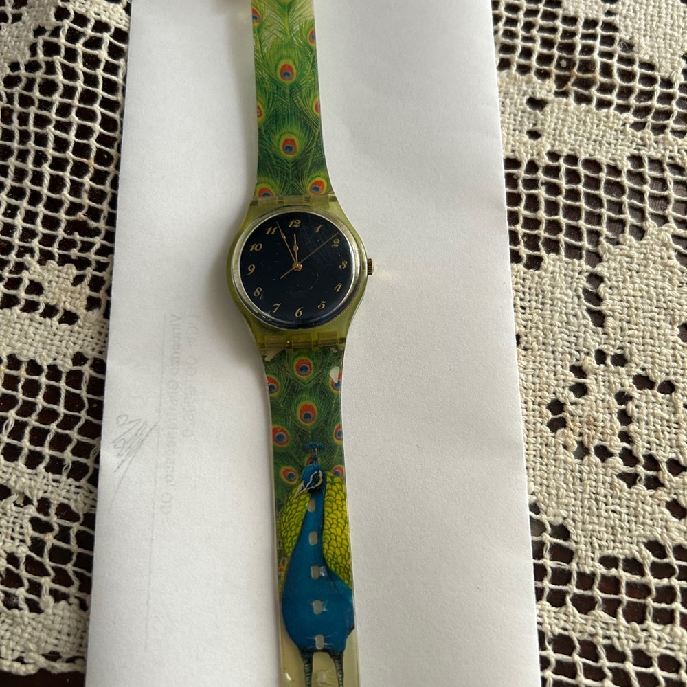 Swatch Peacock  Watch with Black face gold hands